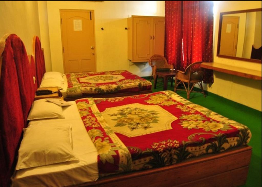 Hotel Ruby International Кодайканал Номер фото